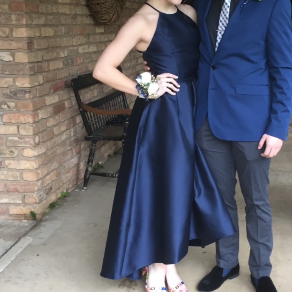 Woman’s blue formal gown